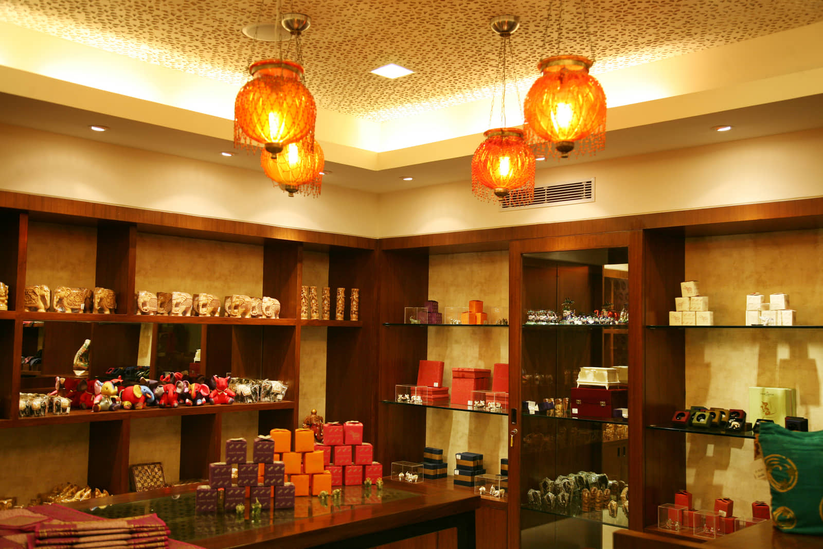 Hand-carved figurines, textiles and gift boxes at the boutique