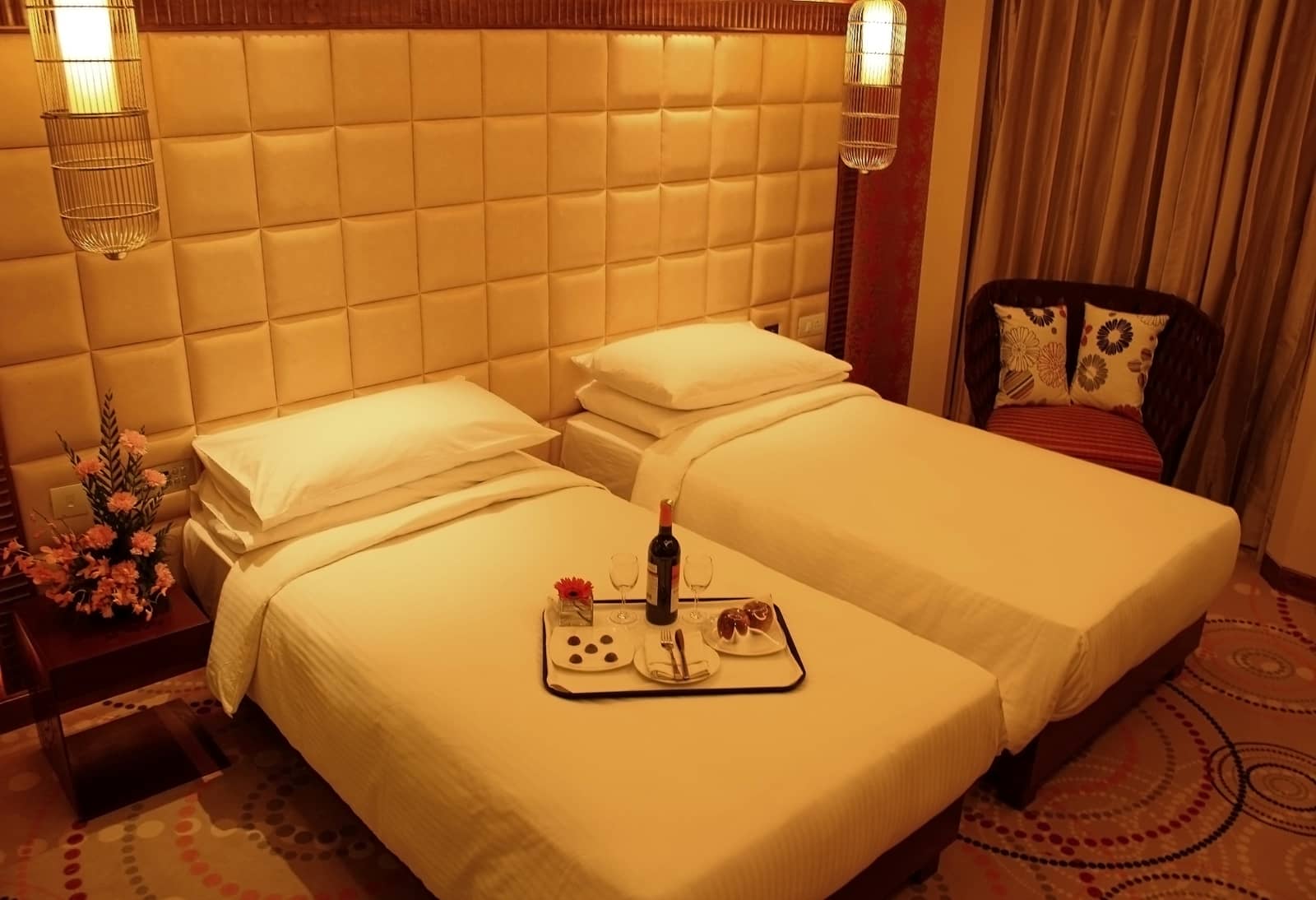 A guest room laid out with twin beds